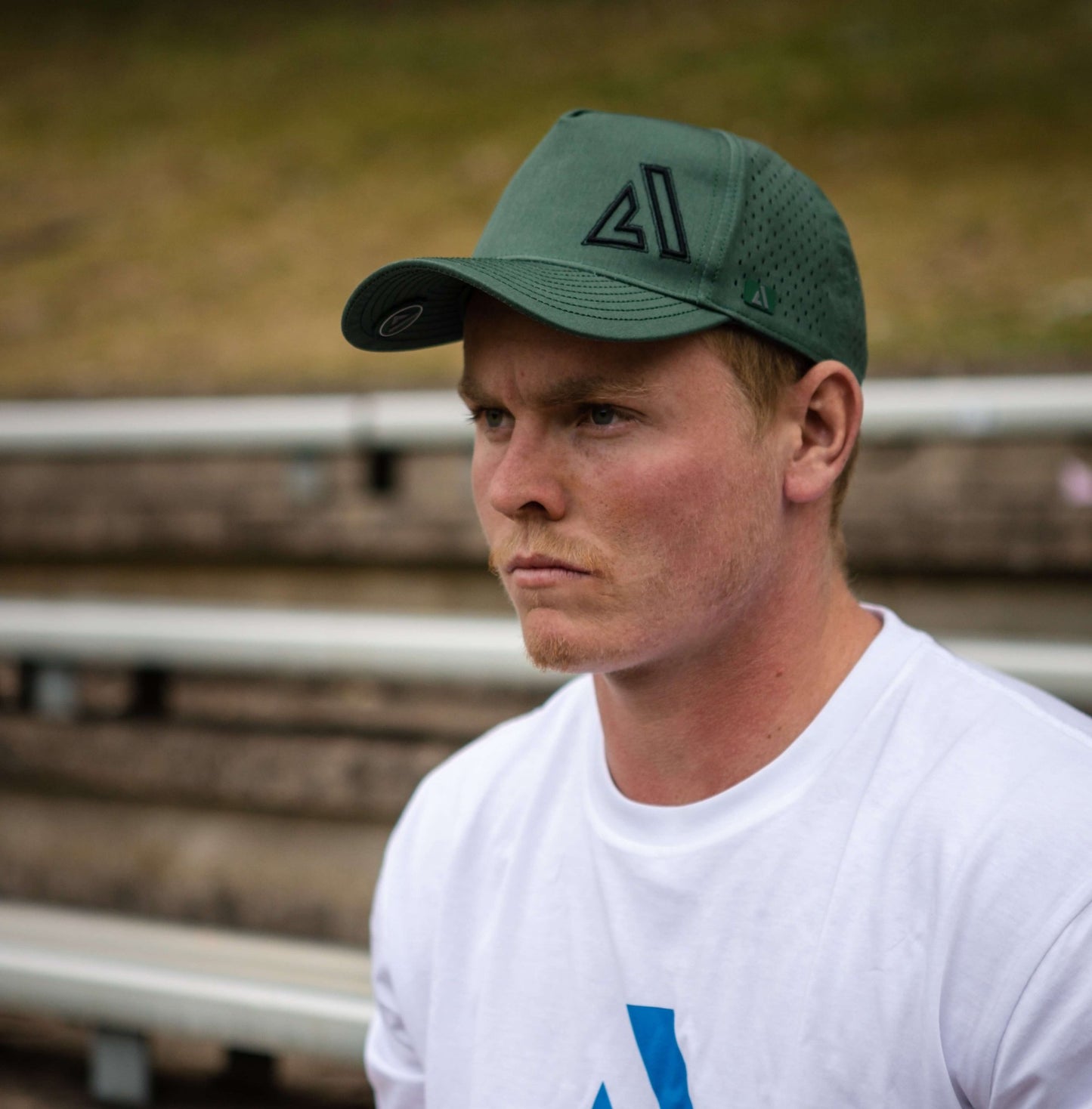 Deep Forest Green Cruz Performance Cap lifestyle view - versatile athletic training cap for everyday performance