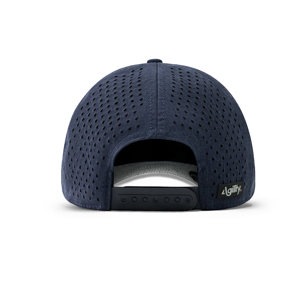 Agility Apparel Pursue Cap in Deep Navy — side profile showing classic mid-profile athletic fit

