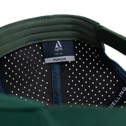 Agility Apparel Pursue Cap in Green — side profile showing classic mid-profile athletic fit
