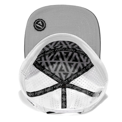 White Pursue Performance Cap by Agility Apparel — UPF 40+ sun protection built for endurance sport
  